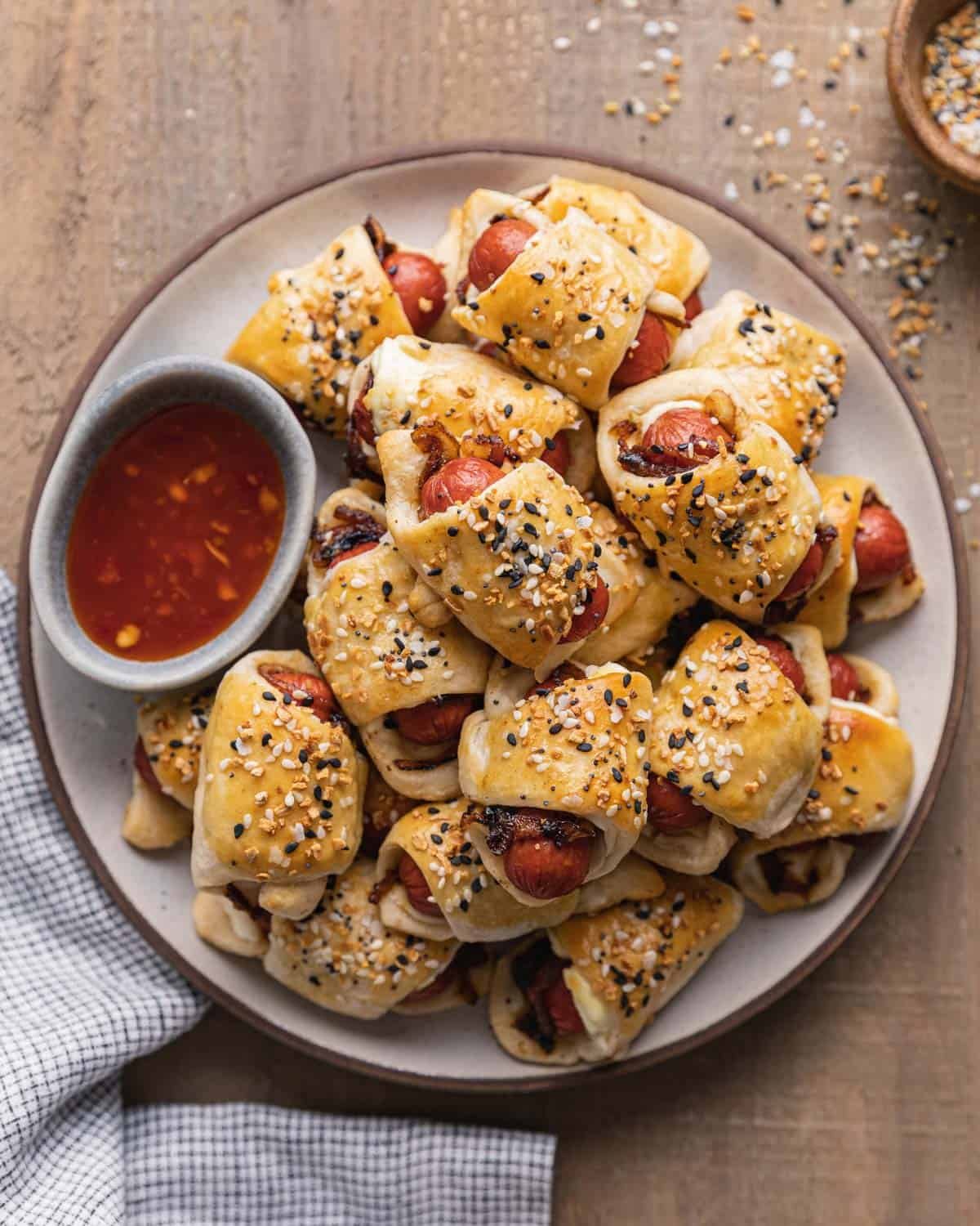 overhead shot of pigs in a blanket on plate