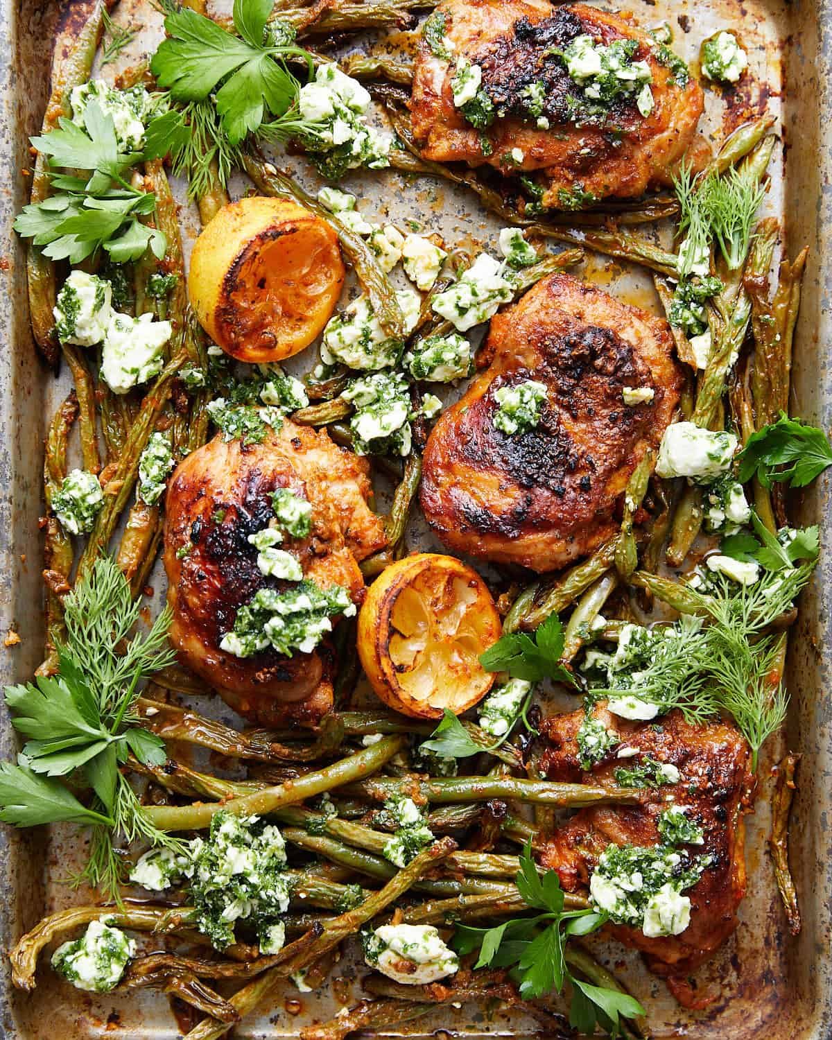 Overhead image of sheet pan chicken and green beans dinner.
