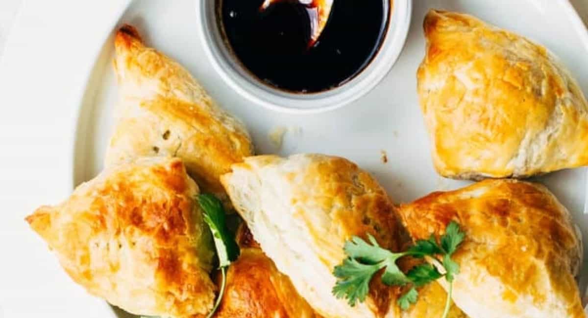 Overhead image of vegetarian spiced potato samosas recipe.