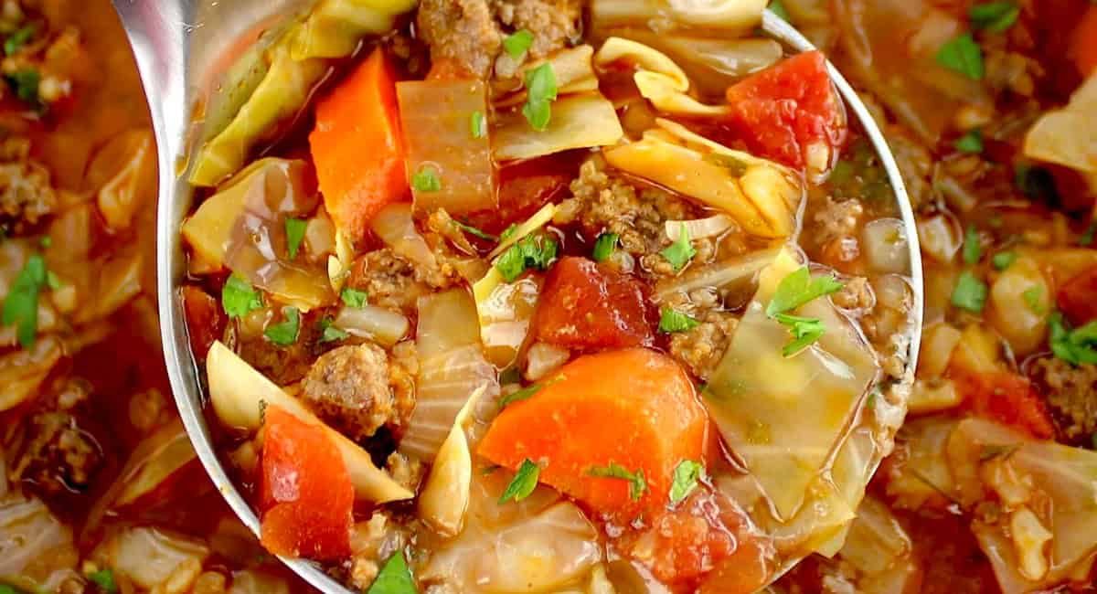 Up close image of slow cooker cabbage roll soup.