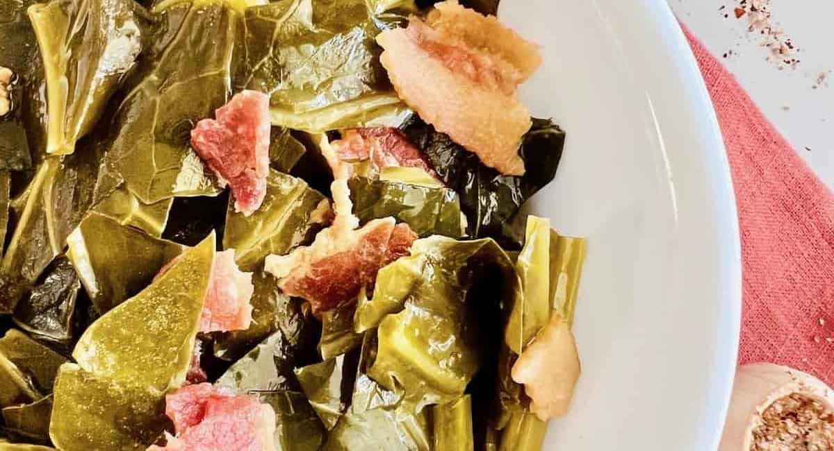 Overhead image of slow cooker collard greens.