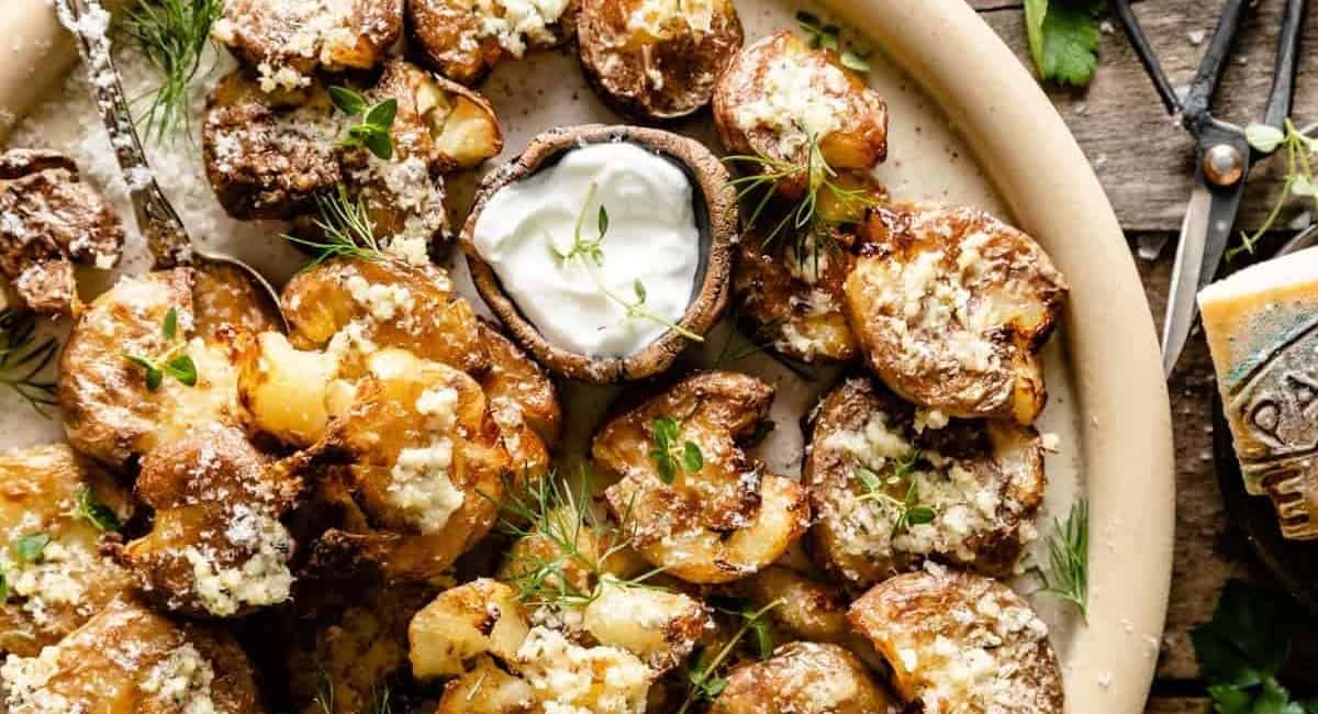 Overhead image of smashed potatoes.