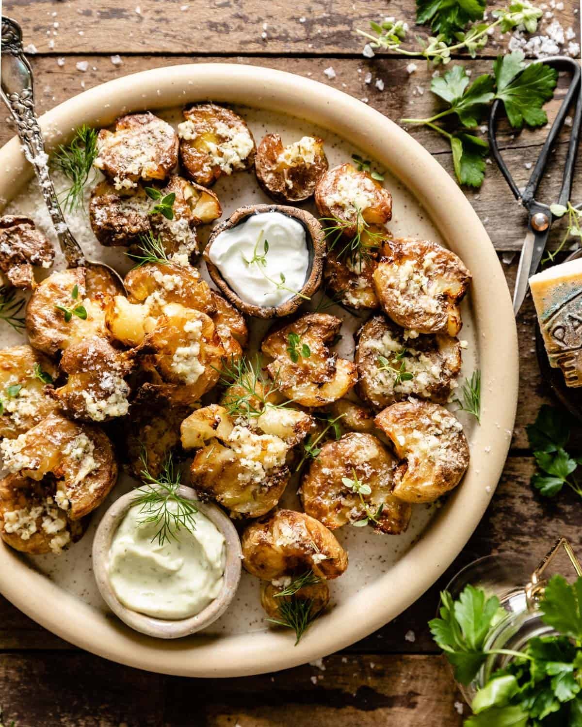 overhead of air fryer smashed potatoes on a plate