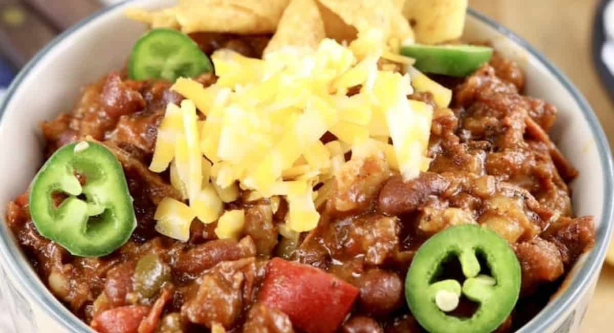 Overhead image of smoked short rib chili with toppings.