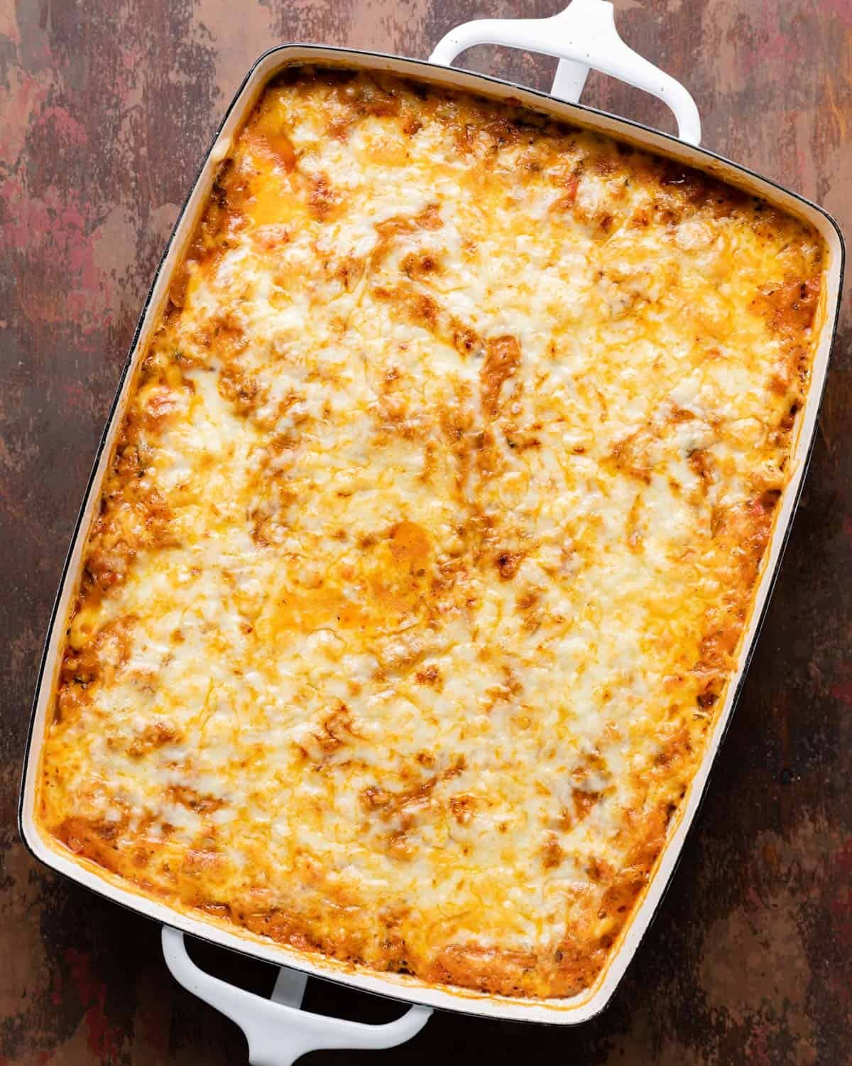 Overhead image of spaghetti squash casserole in white baking dish.