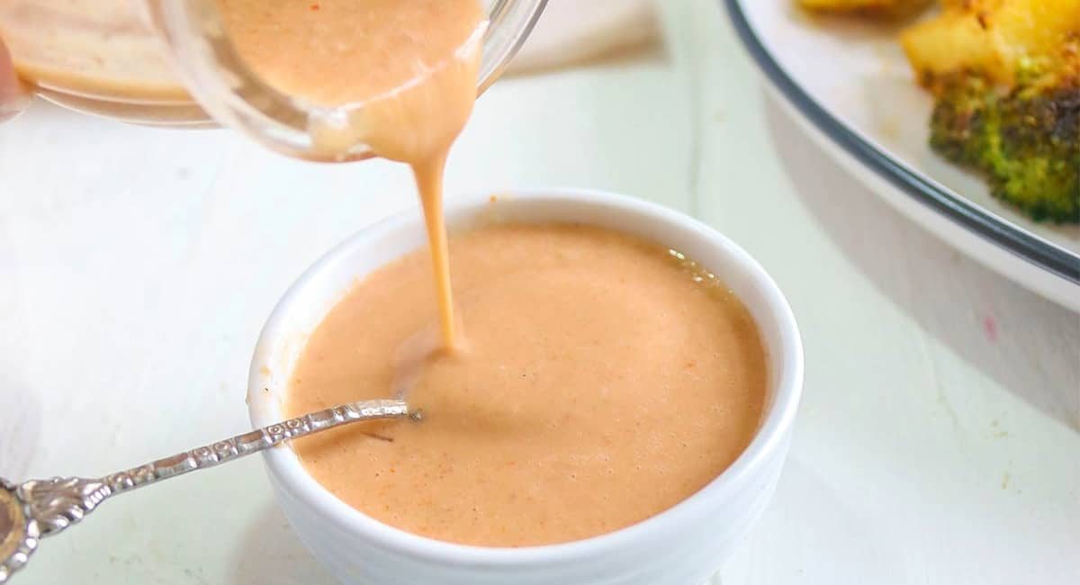Up close image of spicy tahini sauce.