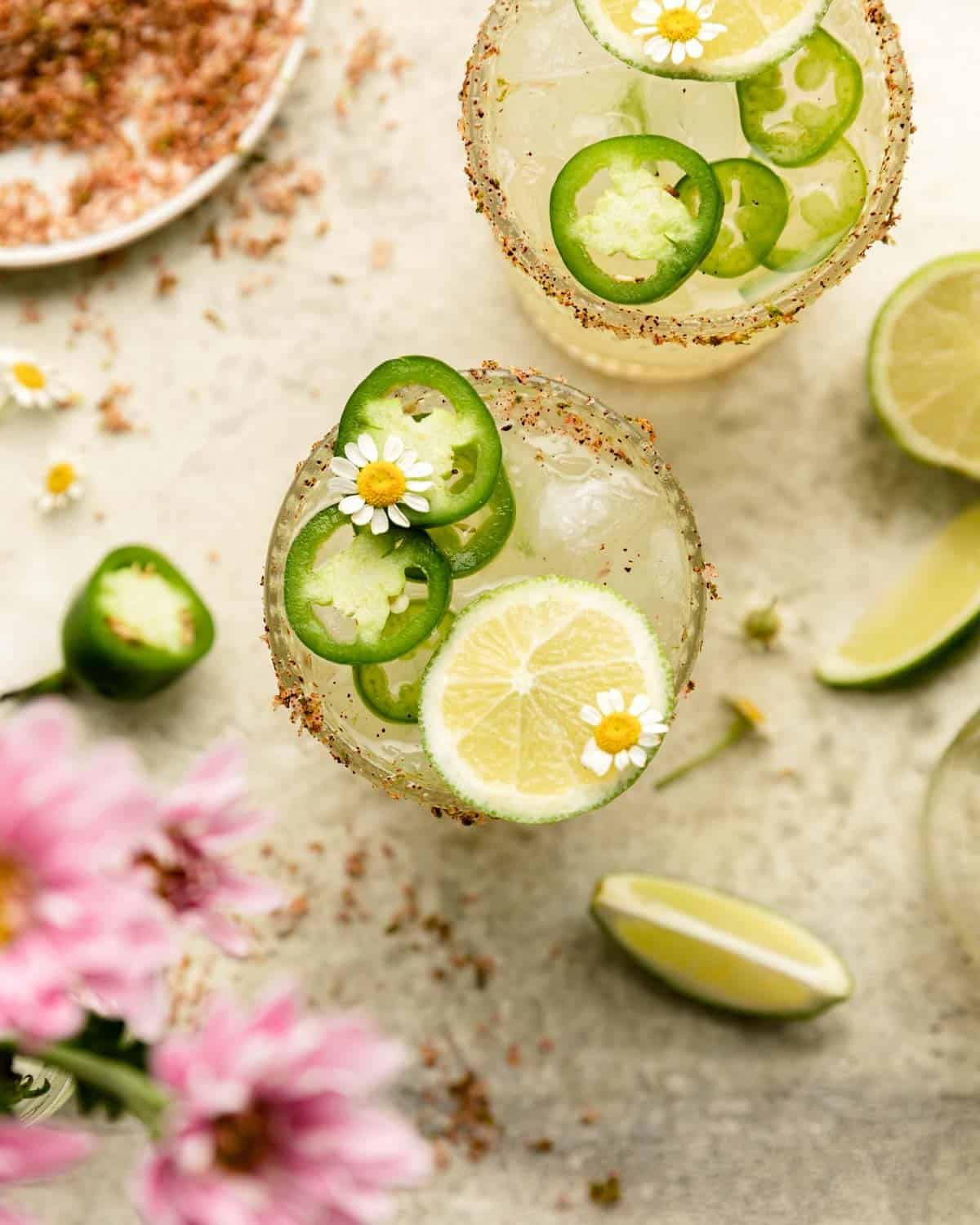 Overhead image of spicy margarita with garnish.