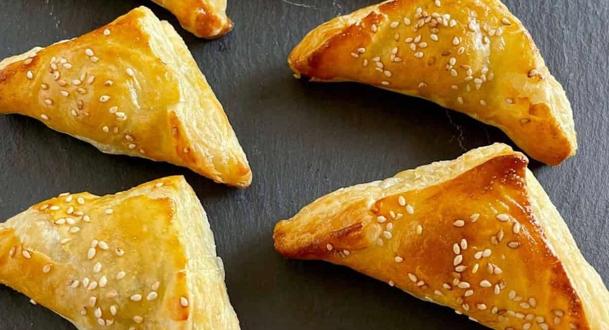 Overhead image of spinach and feta bourekas (puff pastry appetizers).