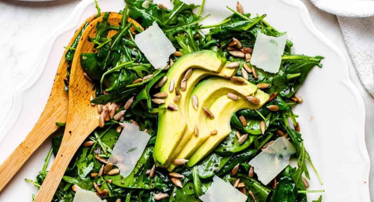 Overhead image of arugula spinach salad.