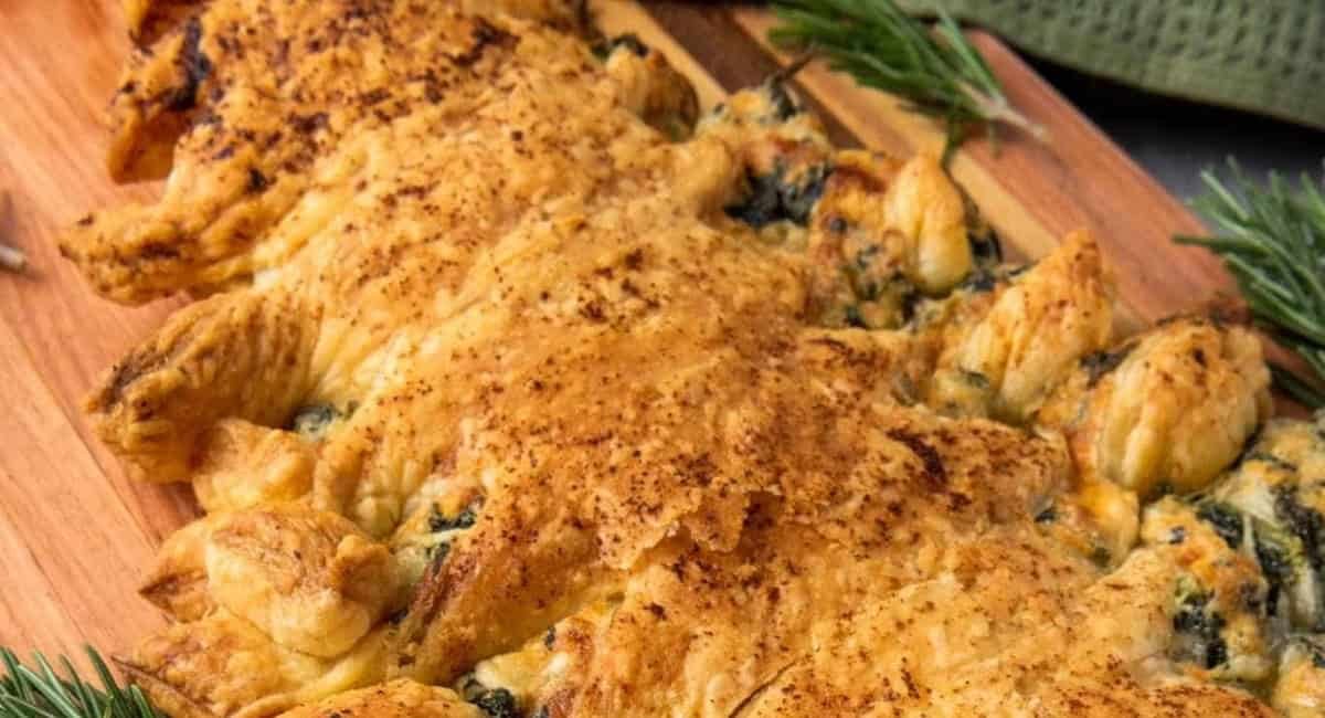 Overhead up close image of Christmas tree spinach dip puff pastry.
