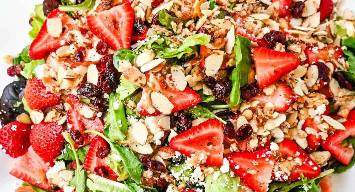 Overhead image of strawberry spring mix salad.