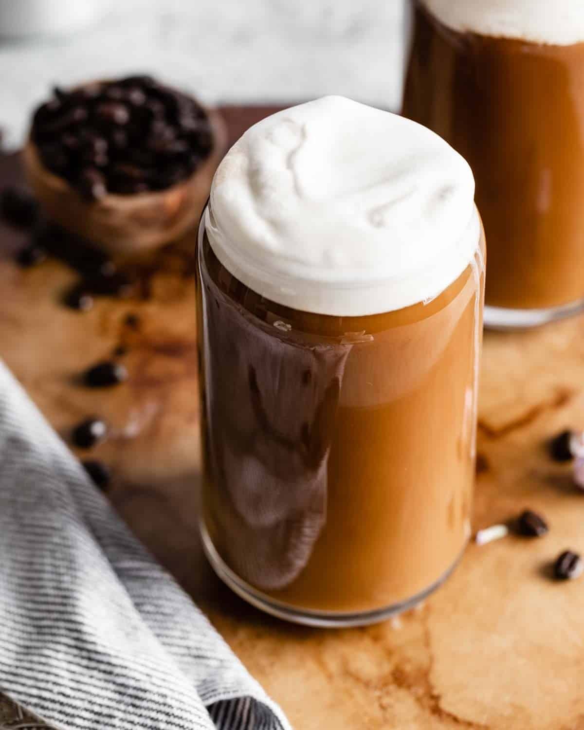 45 degree angle of sweet cream cold foam over coffee