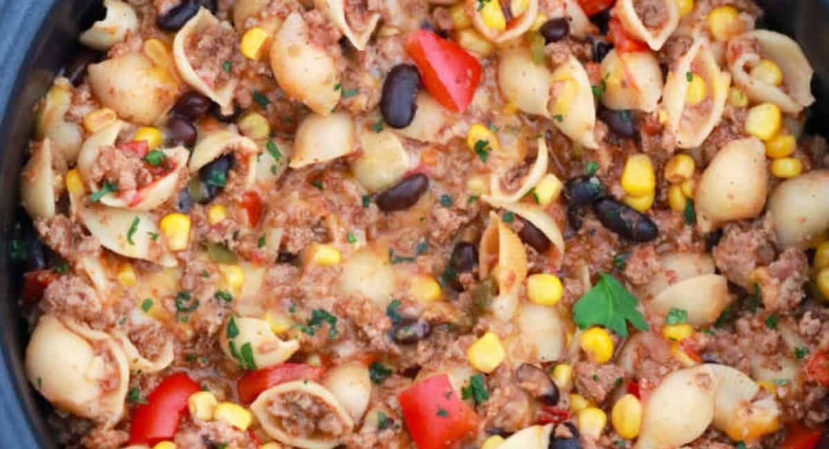 Overhead image of slow cooker taco pasta.