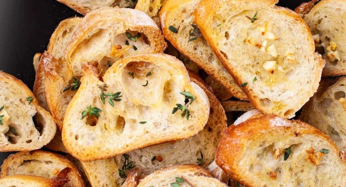Overhead image of easy garlic crostini with olive oil.