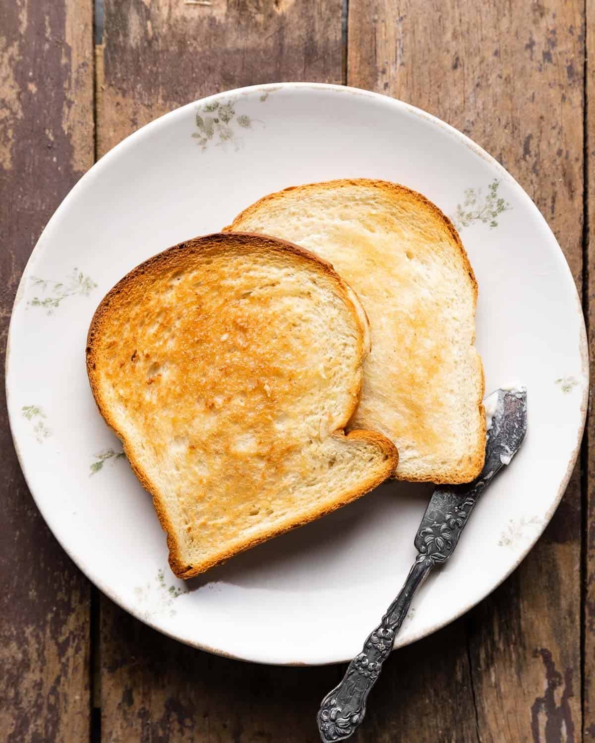toast with oven on a plate with butter