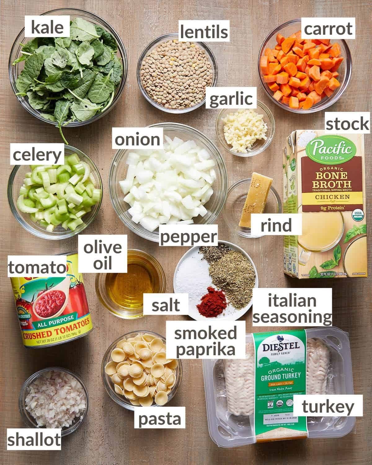 Ingredients needed to make turkey lentil soup.