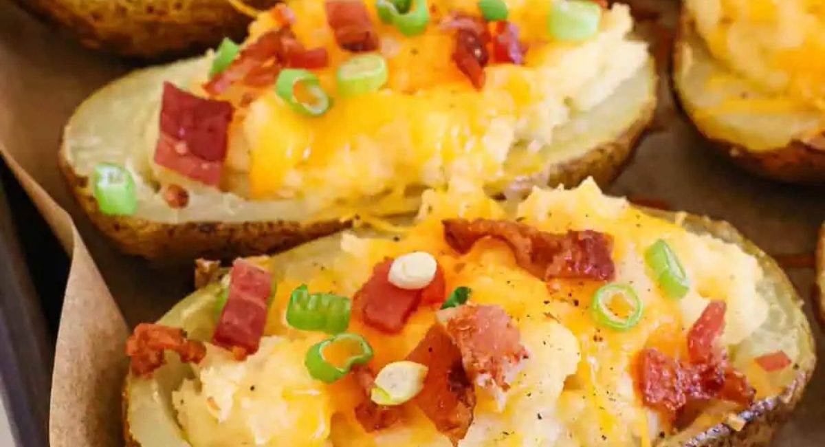 Up close image of twice baked potatoes with garnish.