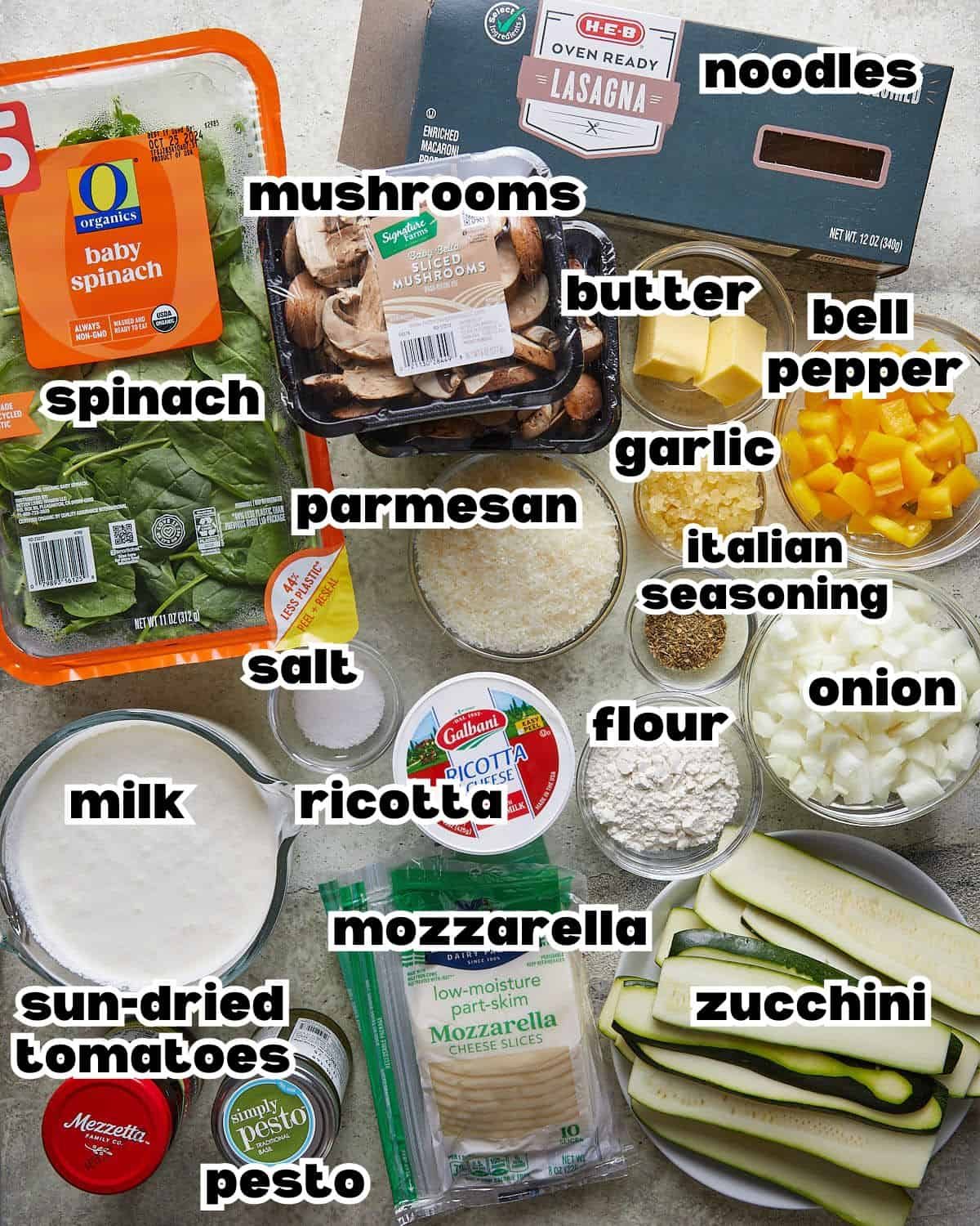 Overhead image of ingredients needed to make veggie lasagna with white sauce.