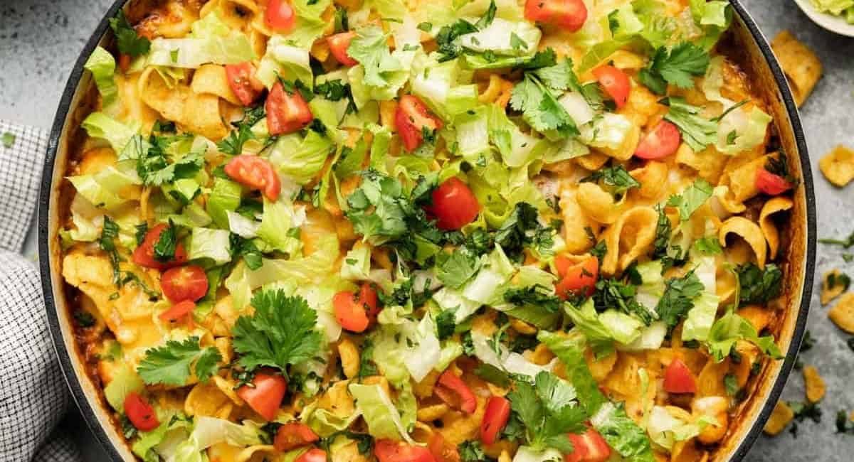 Overhead image of baked walking taco casserole recipe.