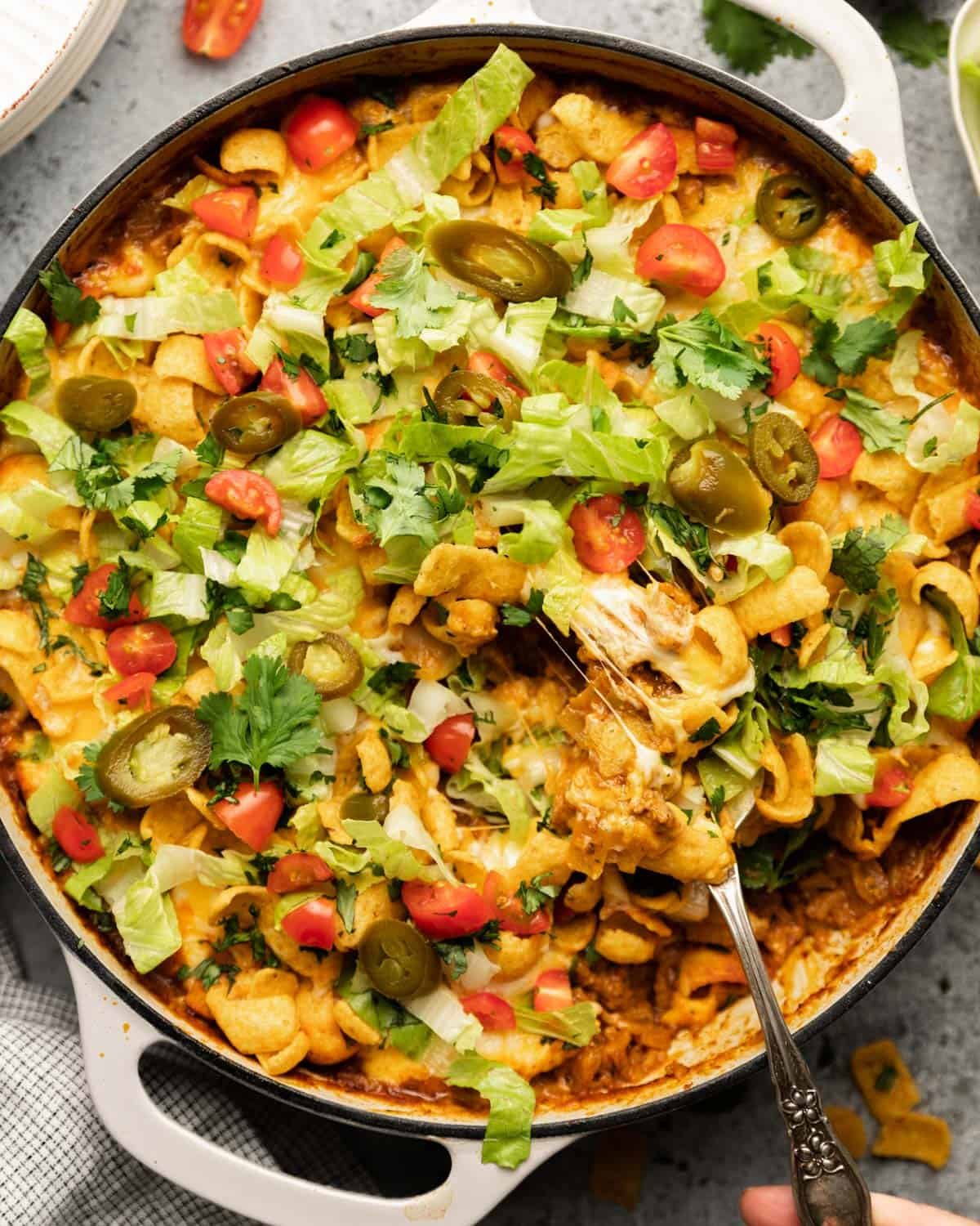 Baked Walking Taco Casserole Recipe with Enchilada Sauce
