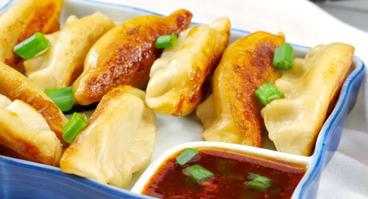 Up close image of Chinese potstickers.