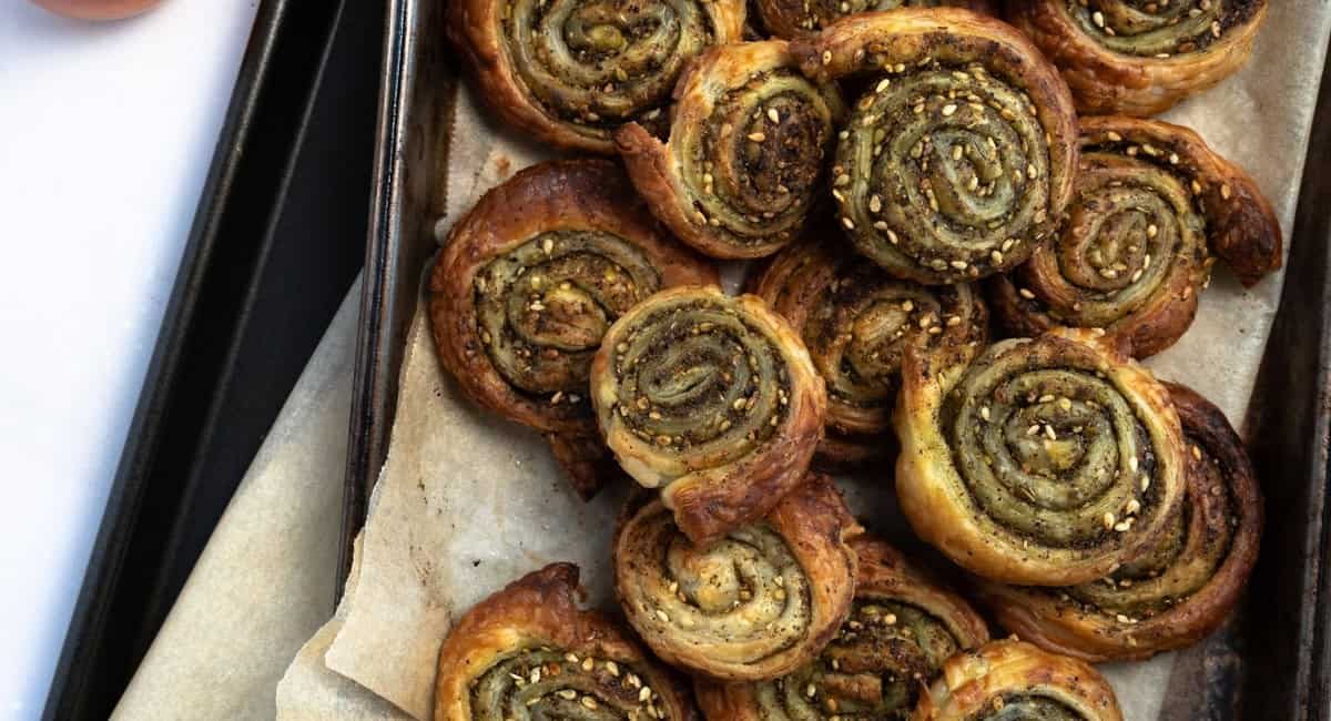 Overhead image of zaatar puff pastry pinwheels.