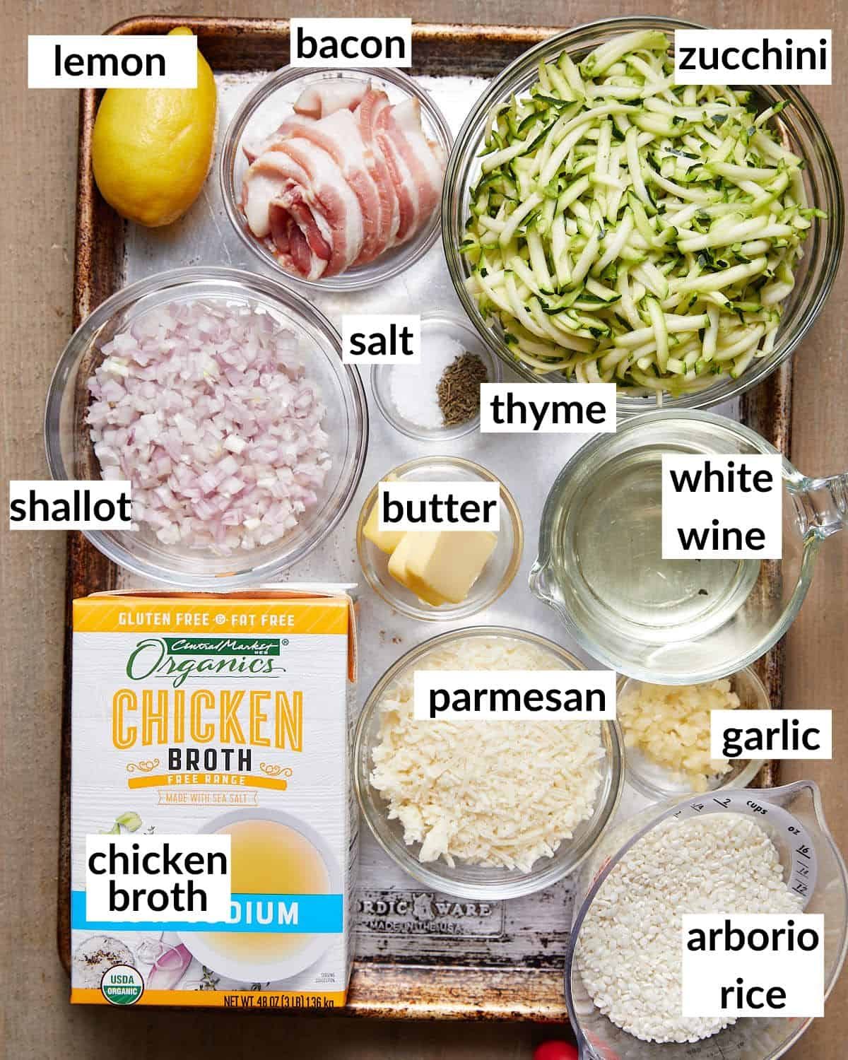 Overhead image of ingredients needed for zucchini risotto.