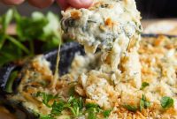 Decadent Cheesy Crab Spinach Artichoke Dip