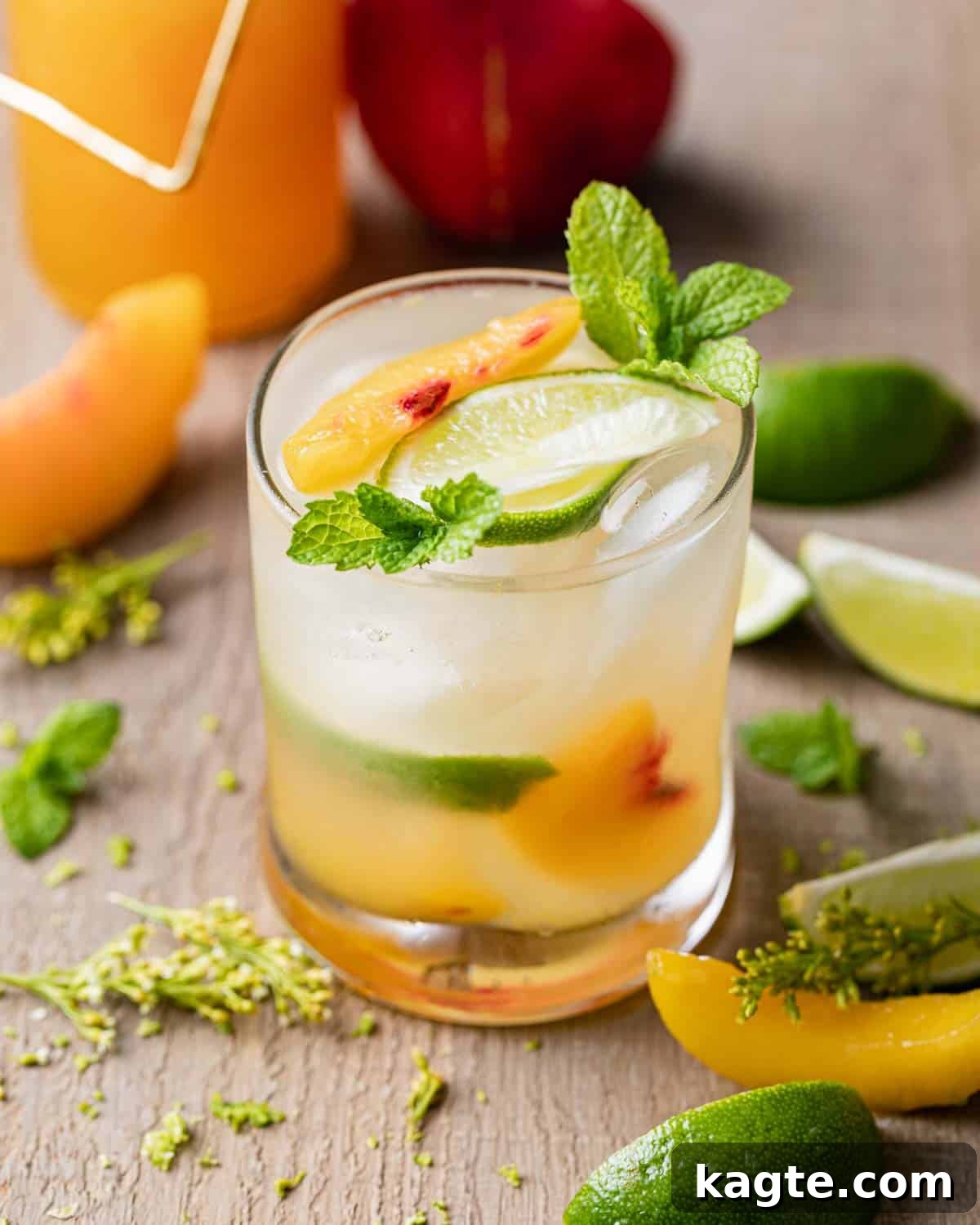 Sun-Kissed Peach Mule 2 A vibrant Peach Moscow Mule in a classic copper mug, garnished with fresh peach slices and mint.