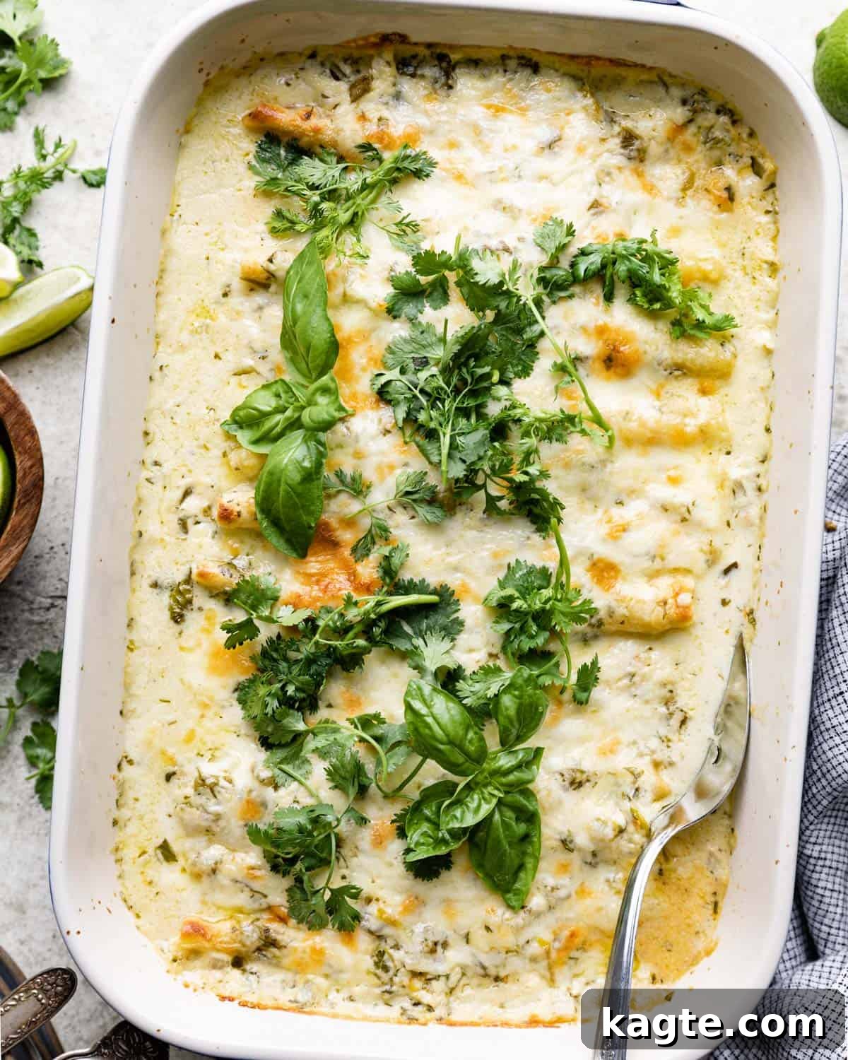 White beef enchiladas in a casserole dish. 