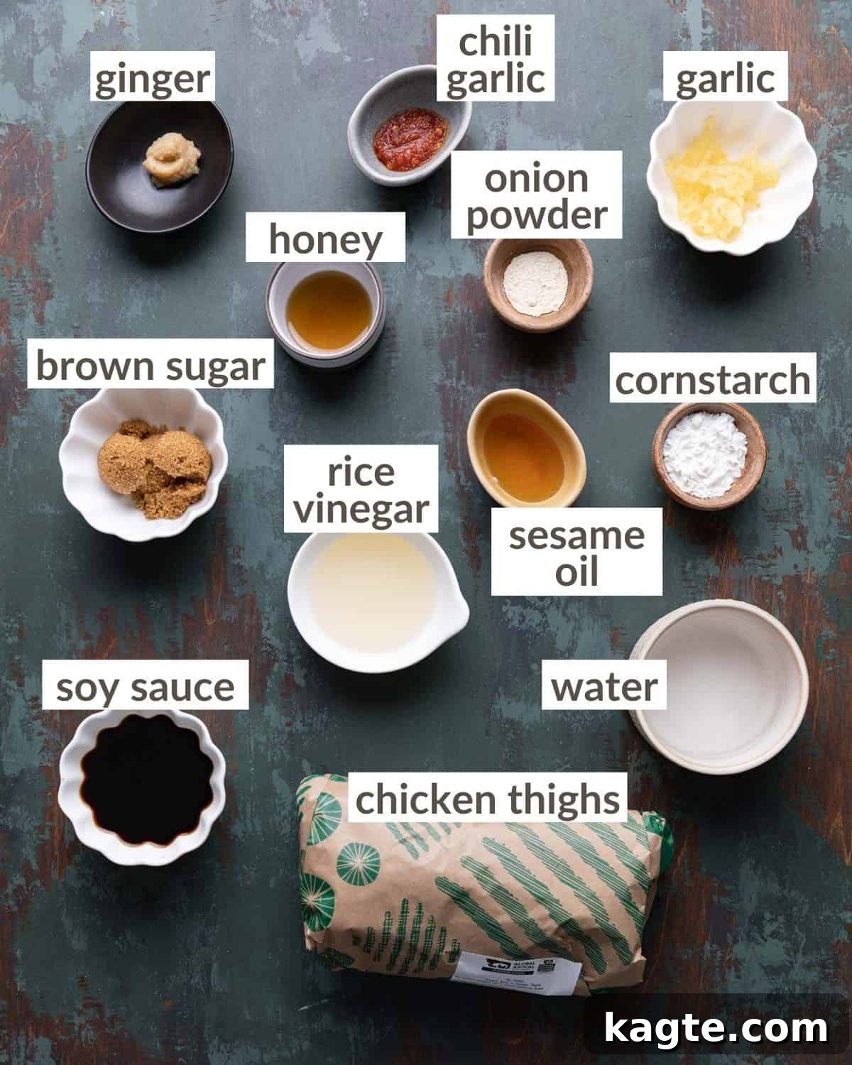 Easy Air Fryer Teriyaki Chicken 3 Ingredients needed to make teriyaki chicken in the air fryer. A collection of ingredients for air fryer teriyaki chicken, including chicken thighs, soy sauce, honey, brown sugar, ginger, garlic, sesame oil, and chili garlic sauce.
