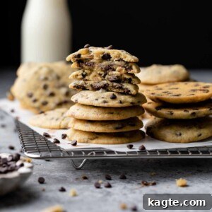 A stack of golden, perfectly baked chocolate chip cookies without brown sugar, showcasing their delicious texture.