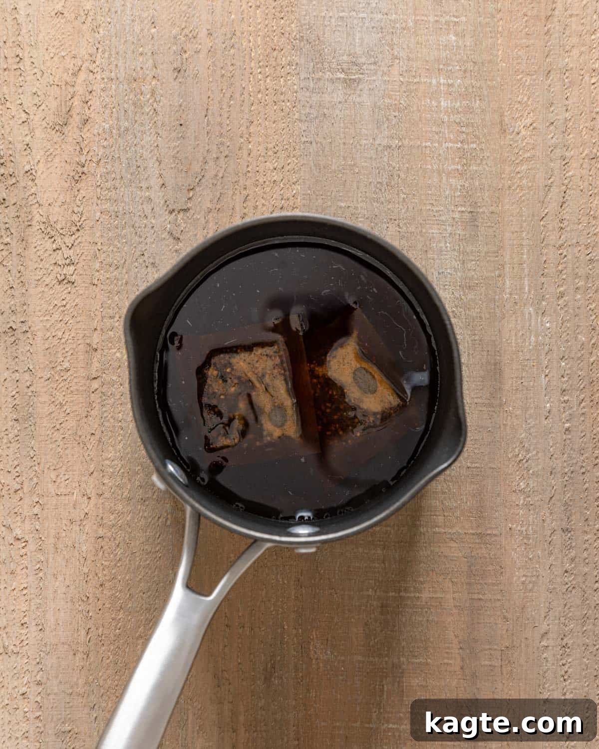 Craft Your Own Starbucks Chai Tea Latte 5 tea bags steeping in a pot with boiling water