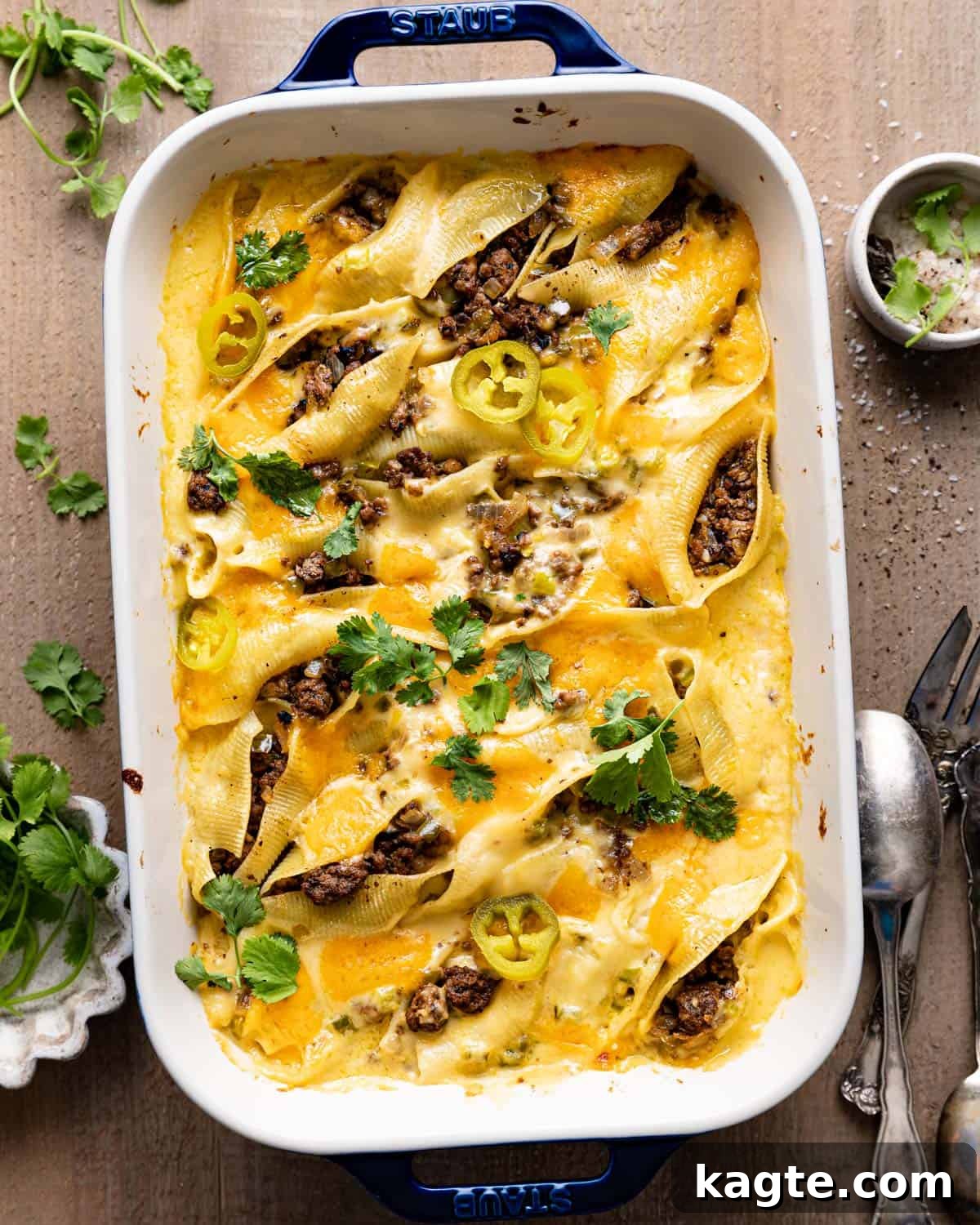 Loaded Philly Cheesesteak Shells 2 Overhead image of Philly cheesesteak stuffed shells with ground beef.