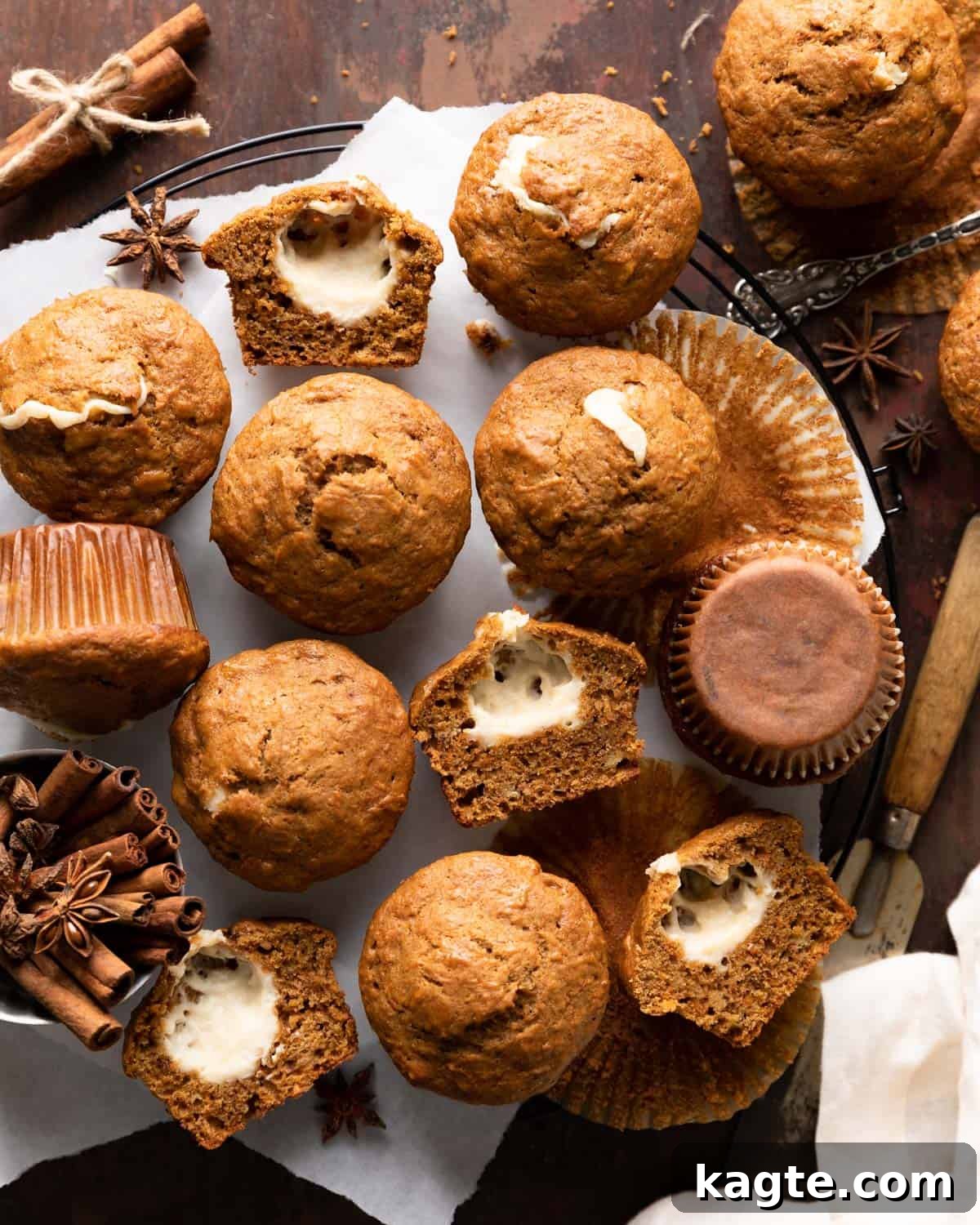Garden Patch Banana Carrot Muffins 2 Overhead shot of freshly baked Banana Carrot Muffins cooling on a wire rack, showcasing their golden-brown tops and inviting texture.