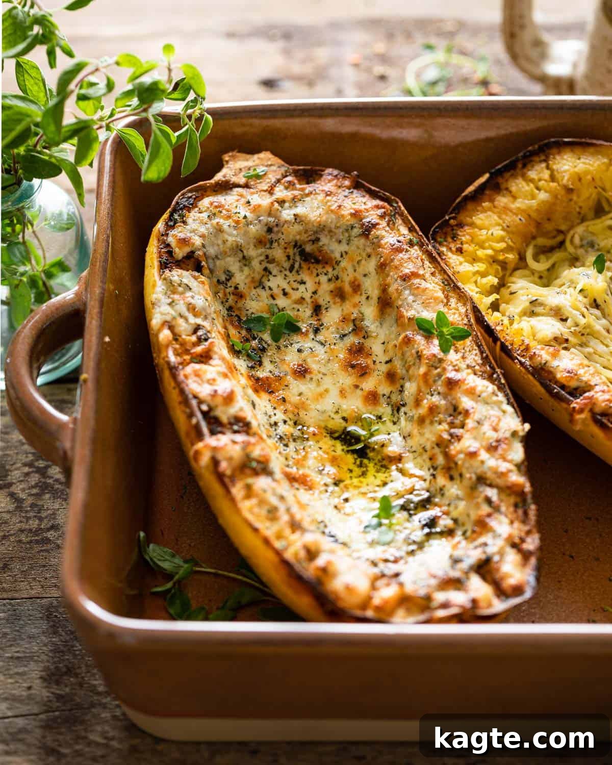 Effortless Air Fryer Spaghetti Squash 7 Air fryer spaghetti squash with cheese on top.