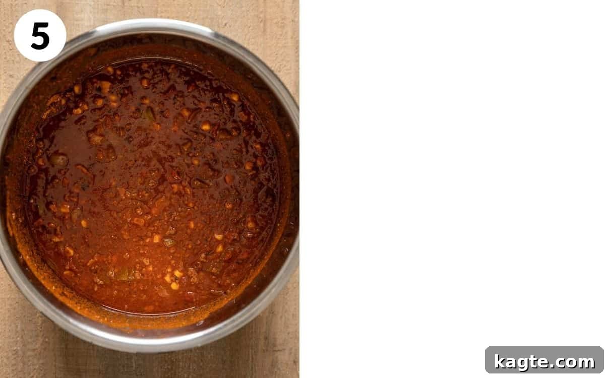 step 5: a vibrant image of the no-bean chili inside the Instant Pot immediately after pressure cooking, ready to be served