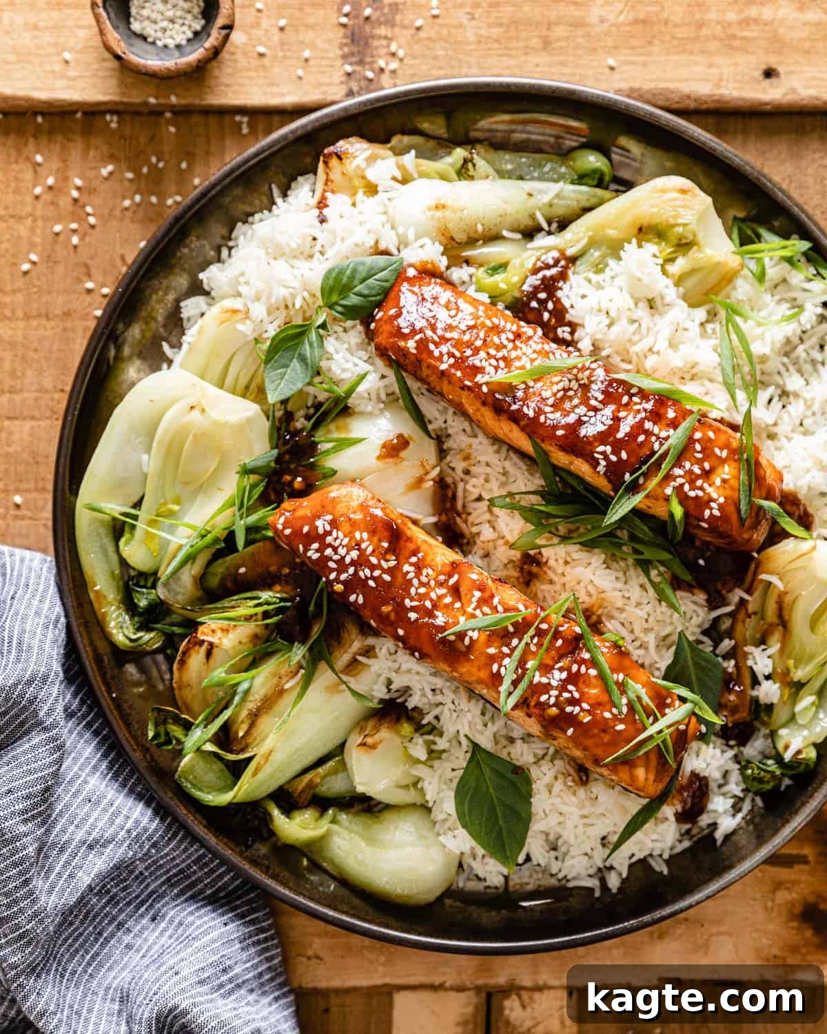 Easy Air Fryer Teriyaki Salmon 2 overhead of teriyaki salmon air fryer over rice and bok choy