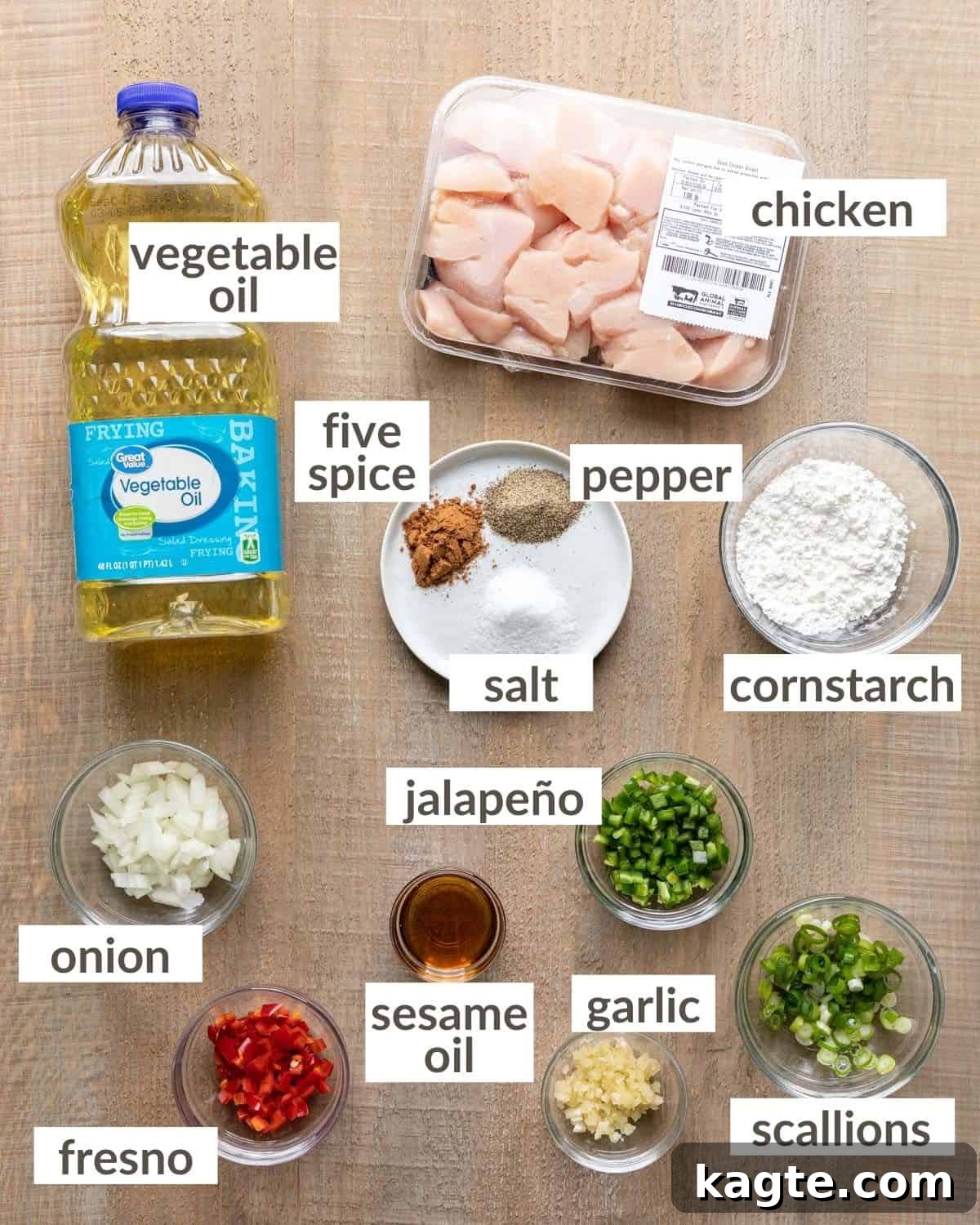 Ingredients for salt and pepper chicken laid out on a kitchen counter