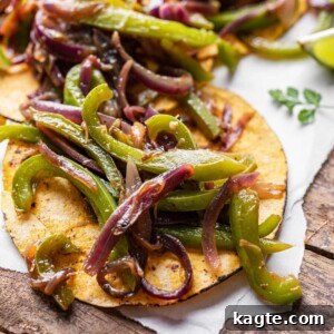 A serving of freshly cooked Chipotle style fajita veggies, showcasing their vibrant colors and tender-crisp texture.