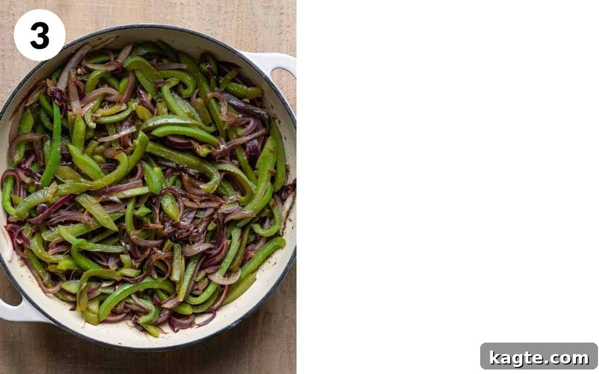 Smoky Chipotle Fajita Vegetables 5 Finished Chipotle style fajita veggies, vibrant and perfectly sautéed with tender-crisp texture and caramelized edges, ready to be served from the pan.