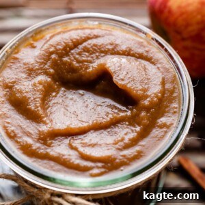 A freshly made jar of egg-free apple curd, ready to be enjoyed or gifted.