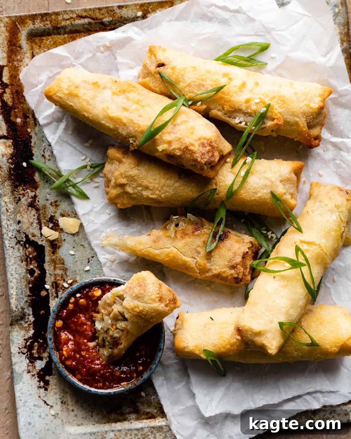 Crispy Air Fried Frozen Egg Rolls 2 Overhead image of air fryer frozen egg rolls, golden and crispy.