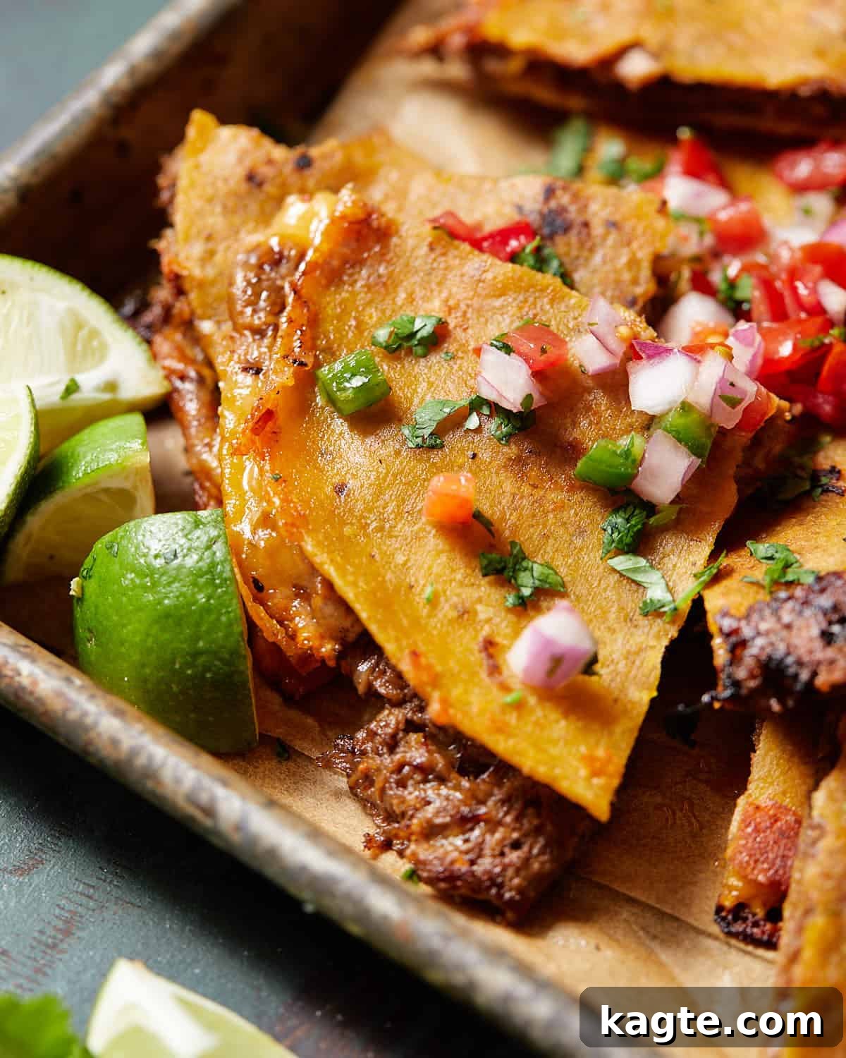 Shows an up close shot of a piece of the finished corn tortilla quesadilla. 