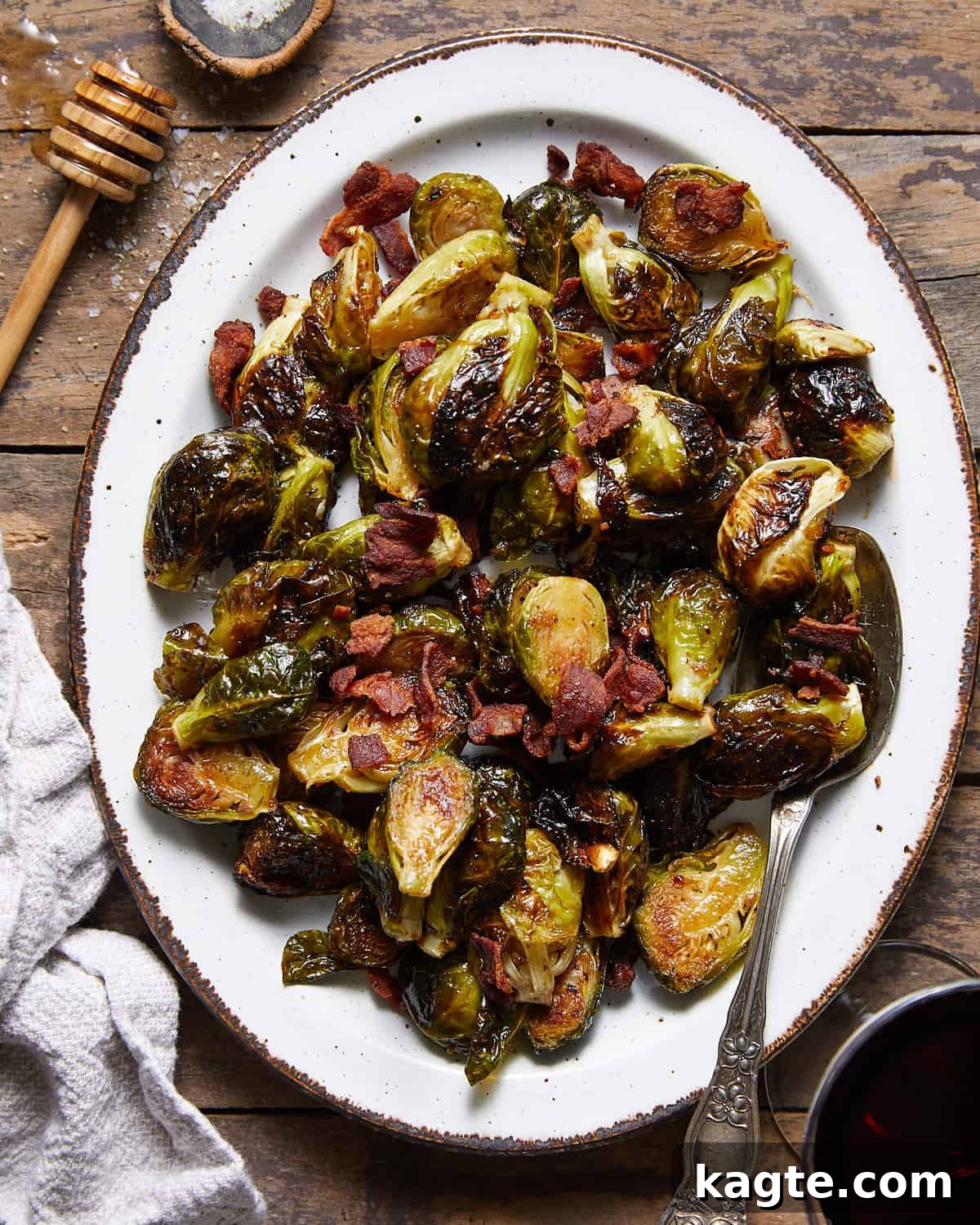Overhead image of crispy glazed brussels sprouts, showing their golden-brown edges and glistening glaze.