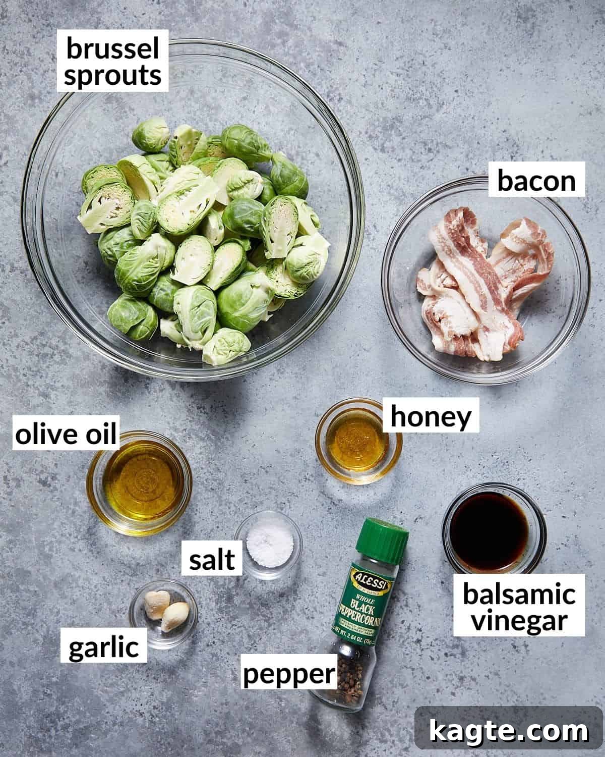 Overhead image of ingredients needed to make crispy glazed brussels sprouts, neatly arranged.