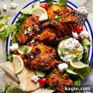 A vibrant Greek yogurt chicken thigh, beautifully cooked and ready to be enjoyed.