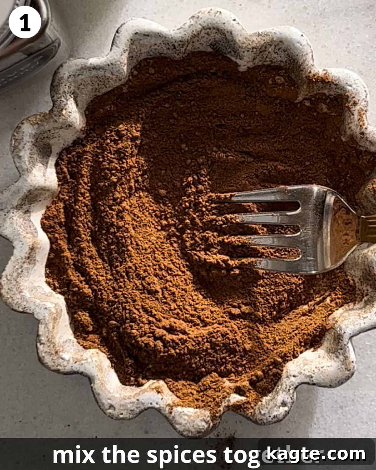 Pumpkin Spice Alternatives 4 A bowl filled with freshly mixed spices, ready to be stored as homemade pumpkin pie spice.