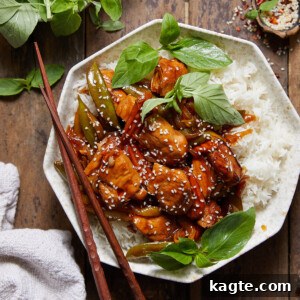 Stir Fry Marinated Chicken in a bowl with chopsticks.