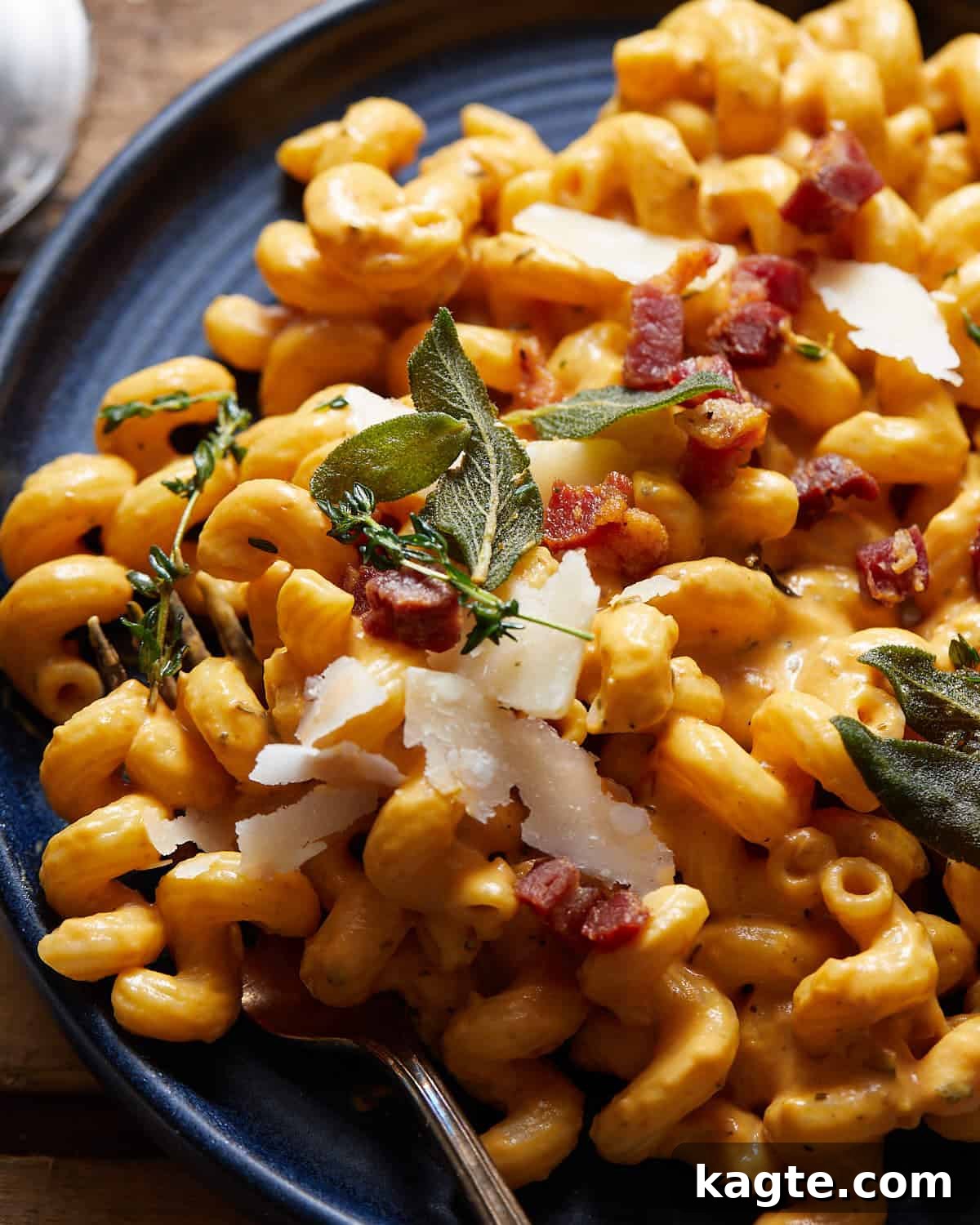 Golden Pumpkin Pasta Sauce 6 Pumpkin pasta sauce with pancetta and fried sage leaves on top.